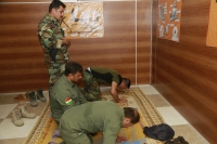 Prima di recarsi in battaglia, i Peshmerga si affidano al loro Dio